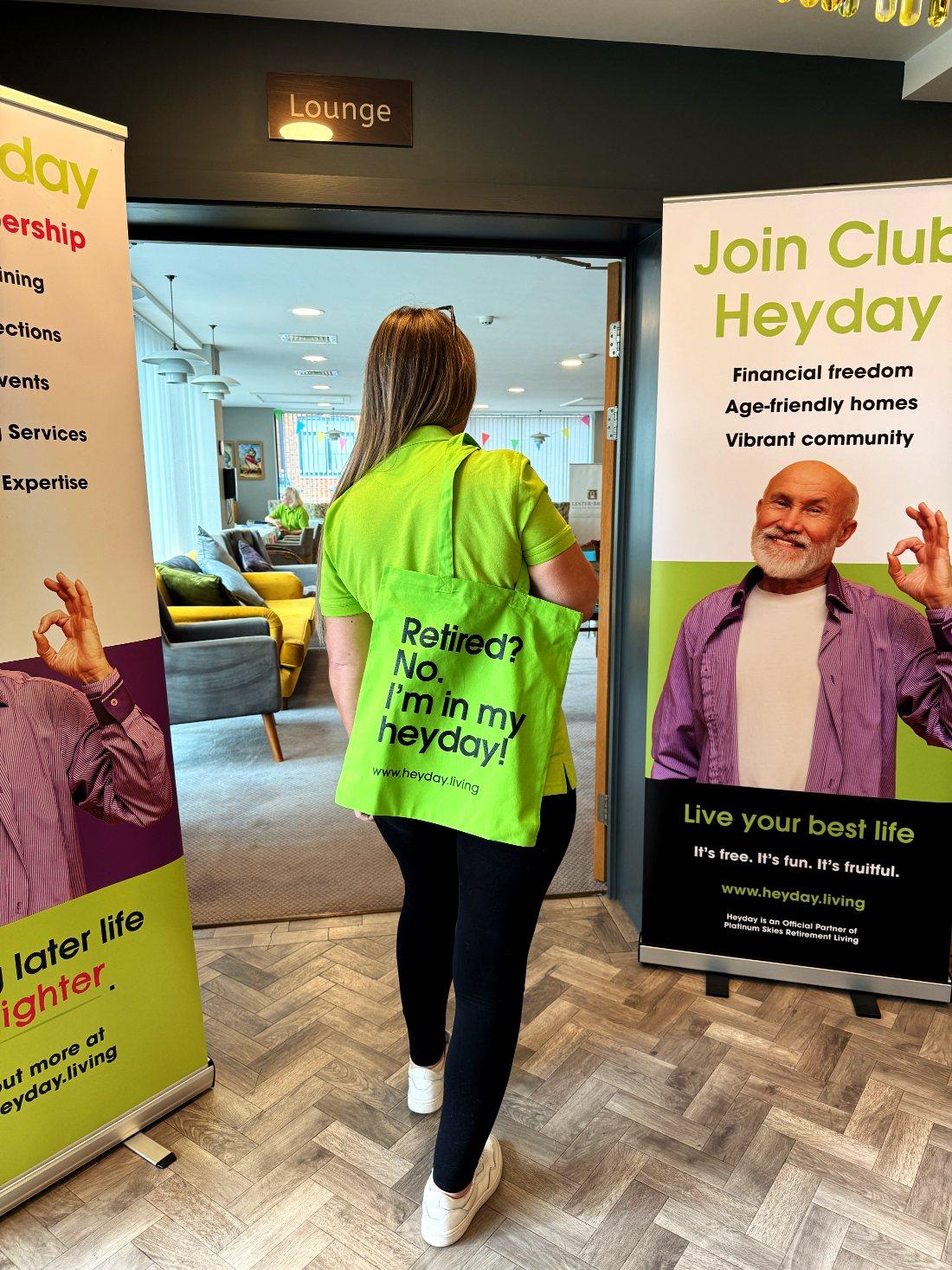 A lime Heyday tote bag that reads: Retired? No. I'm in my heyday!